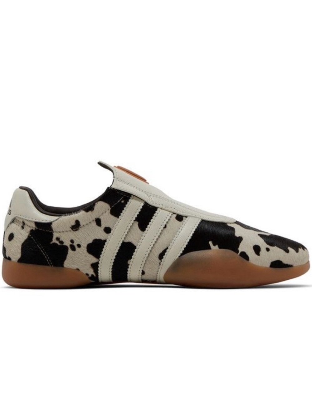 Worn once Rare Adidas Taekwondo Mei Women's sneaker in “cow print”. Size 9 .